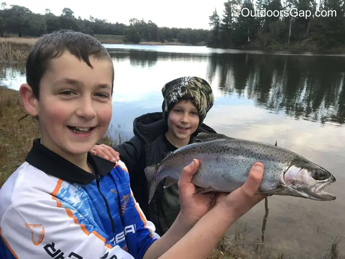 Kids fishing shirt. Young anglers with rainbow trout.